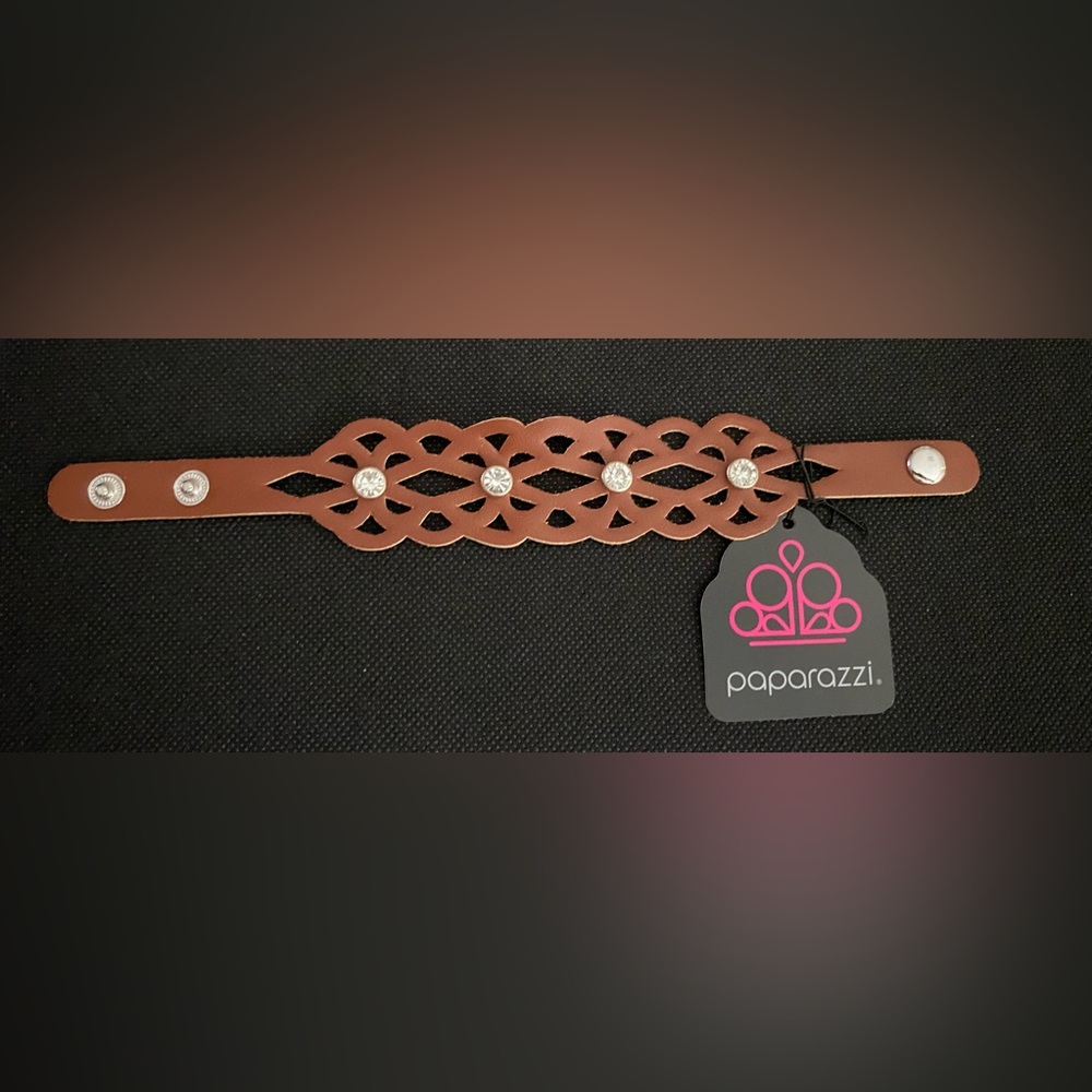 Brown and white rhinestone flower pattern wrap bracelet.